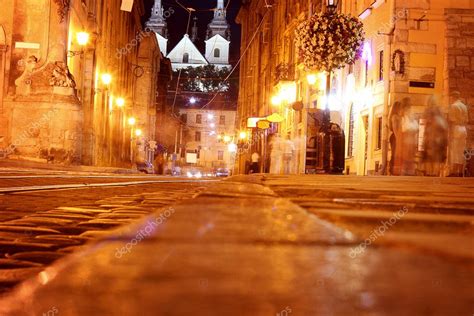 Night old town and bright street light — Stock Photo © alexroz #6916875