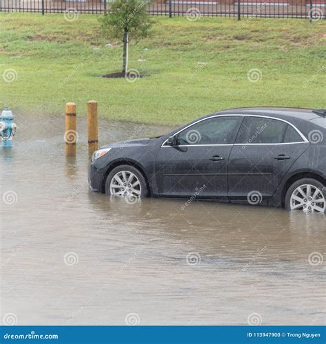 Car Swamped By Hurricane Flood Water In East Houston Texas USA Stock