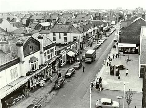 An Old Black And White Photo Of A City Street