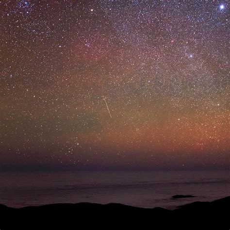 Night Sky Over The Pacific Ocean Photograph by Babak Tafreshi