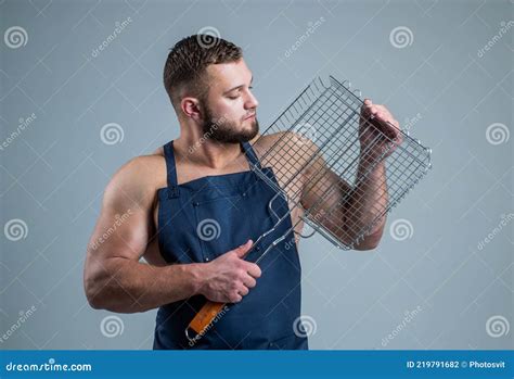 Muscular Man Cooking On Barbecue Grill Healthy Food And Dieting Man