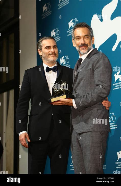 Joaquin Phoenix And Todd Phillips Pose With The Golden Lion For Best