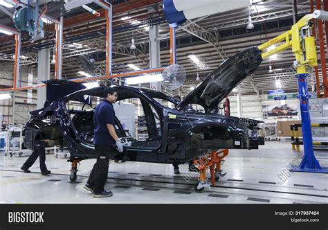 Workers Assembles Cars Image And Photo Free Trial Bigstock