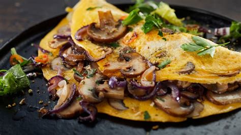 The Secret To The Absolute Best Omelet Is Cooking The Fillings First