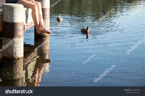 Young Girls Legs Dangle Wooden Dock Stock Photo 1539438182 Shutterstock