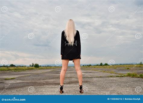 Blonde In A Mini Skirt On Runway Stock Photo Image Of Airstrip