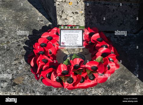 Red poppy Royal British Legion Remembrance Day wreath at Great Bedwyn ...