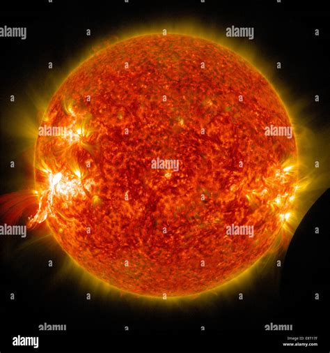 Nasas Sdo Sees A Solar Flare And A Lunar Transit Stock Photo Alamy