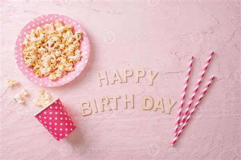 Birthday party background, border of confetti, sweets, lollipops and ...