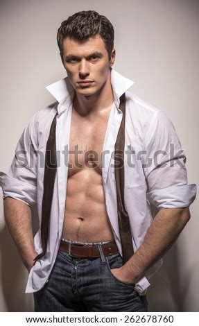 Unbuttoned Shirt Stock Photos, Images, & Pictures | Shutterstock