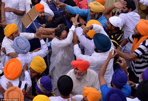 Sword Wielding Sikhs Clash At Indias Golden Temple During Prayers