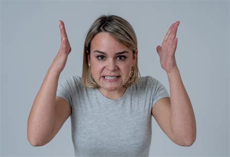 Portrait Of A Beautiful Young Woman With Angry Face Looking Furious