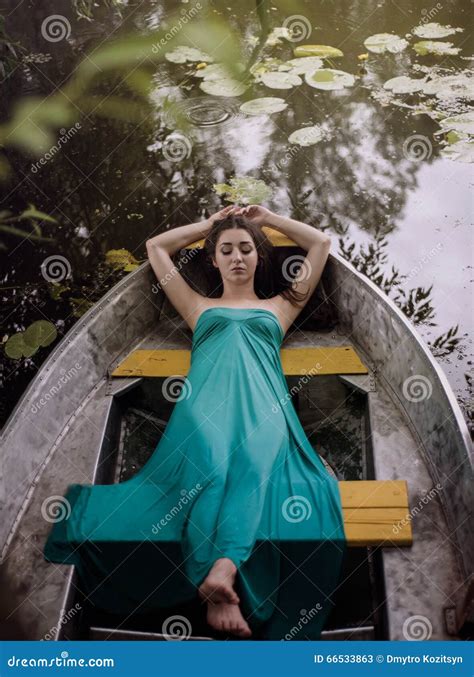 Long Hair Brunette In A Dress Lying On The Boat Stock Image Image Of Adults Dress