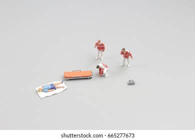 Tiny Rescue Team Providing First Aid Stock Photo Shutterstock