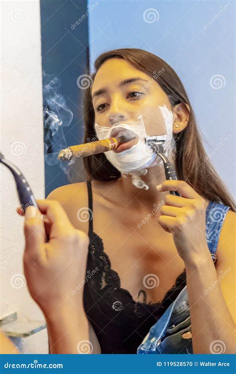 Lingerie Hispanic Brunette Model Shaving Her Face In The Ba Stock Photo
