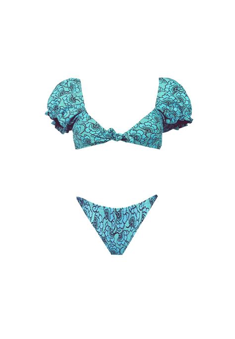 Rita Ora Displays Her Incredible Figure In A Blue Bikini And Matching