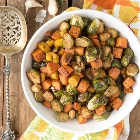 Herb Roasted Garlic Brussels Sprouts Sweet Potatoes And Carrots