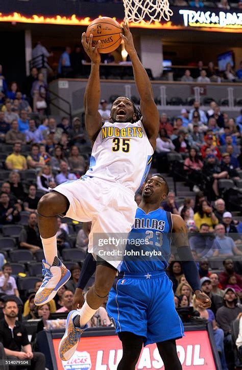 Denver Nuggets Forward Kenneth Faried Goes Up For A Basket Past News