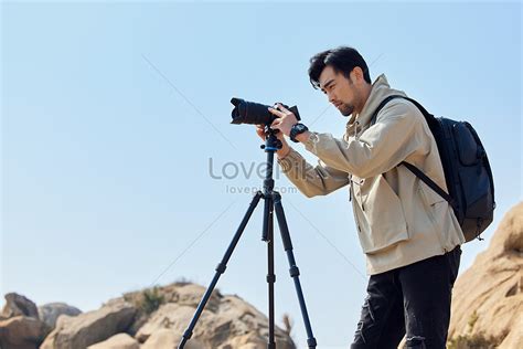 Landscape Photographer Climbing Using Tripod Picture And HD Photos ...