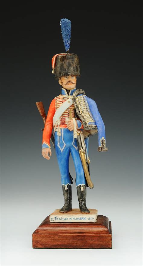 BERNARD BELLUC FIGURINE EN PORCELAINE Hussard du 12ème Régiment 1812