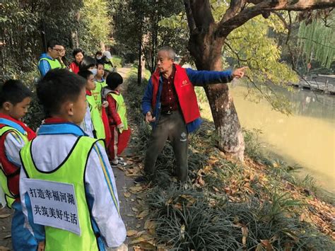 西湖区古荡街道举办“绿色毅行”巡河活动——浙江在线