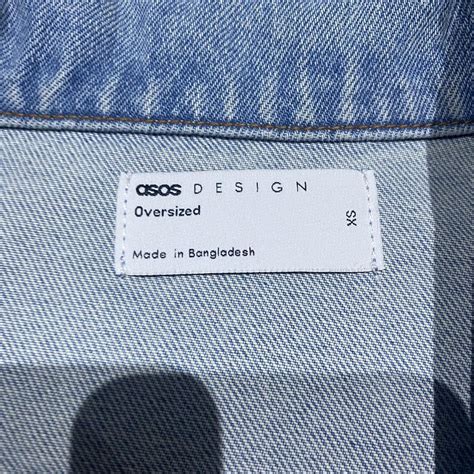 ASOS DESIGN oversized denim jacket in tinted light... - Depop