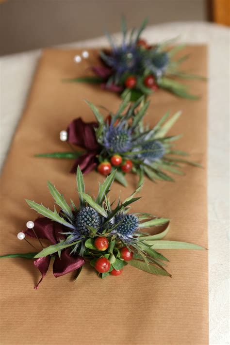 Gents Buttonholes | Holly wedding, Small bridal bouquets, Thistle ...