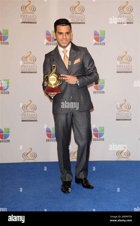 Tito El Bambino Poses Backstage At Univisions 2012 Premio Lo Nuestro A