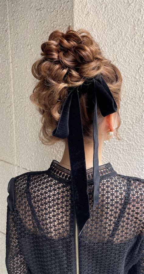 A Trendy Collection Of Hairstyles Adorned With Chic Bows Messy Top