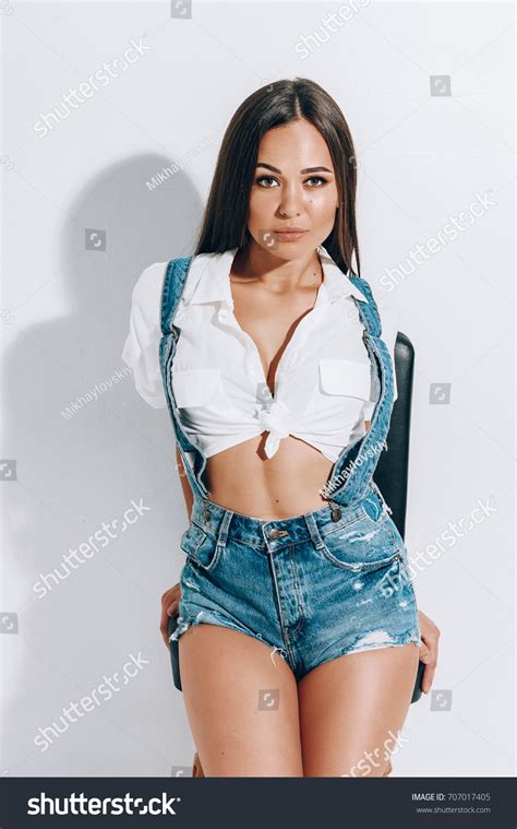 Longlegged Brunette Wide Hips Denim Shorts Stock Photo