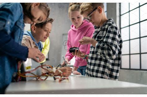 Group of kids working together on | School & Education Stock Photos ...