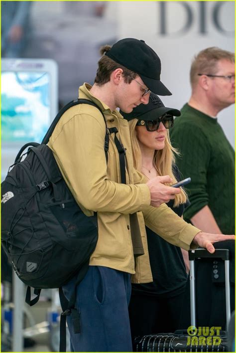 Ellie Goulding Arrives at Miami Airport with Husband Caspar Jopling ...