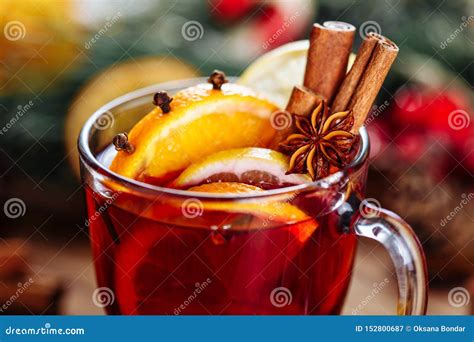 Christmas Mulled Red Wine With Spices And Fruits On A Wooden Rustic Table Traditional Hot Drink