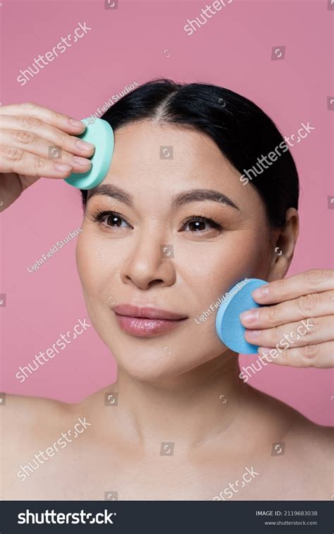 Asian Woman Naked Shoulders Cleaning Face Stock Photo