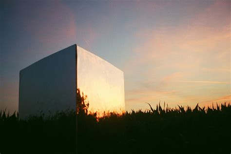 Photo Of A Cube Mirror And Reflections · Free Stock Photo