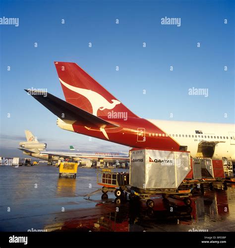 Uk England Manchester Airport Cargo Being Loaded Onto Qantas