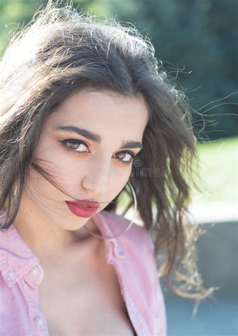 Sensual Woman With Perfect Make Up And Shinning Long Brunette Hair