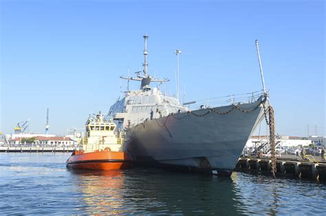 Navy Decommissions First Littoral Combat Ship USS Freedom Strikes Tug