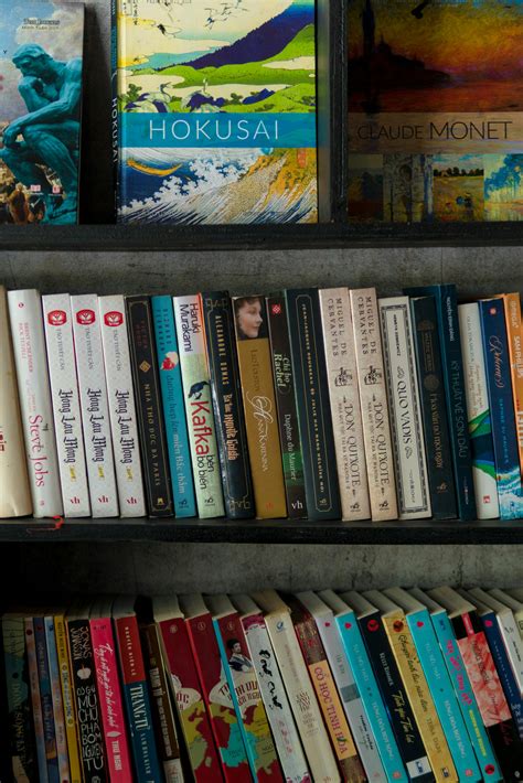 selective focus photography  purple flowers  book page  stock