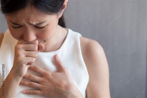 Sick Asian Woman Coughing Hiccupping Choking Stock Photo Adobe Stock