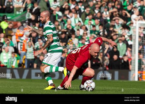 Celtic Legends Marc Cross against Liverpool Legends Charlie Adam during ...