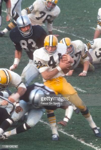 Donny Anderson Of The Green Bay Packers Carries The Ball Against The