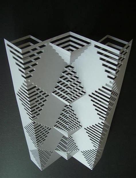 Dobrando, cortando e esculpindo papel. É assim que Elod Beregszaszi ...