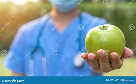 World Health Day An Apple A Day Keeps The Doctor Away Concept For