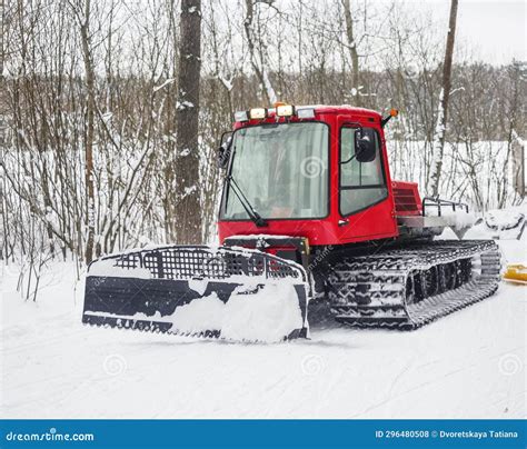 A Snowcat Grooms a Road for the Ski Tracks in the City Park Stock Photo - Image of overcapture ...