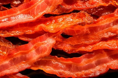 Premium Photo | Closeup of stacked crispy bacon strips