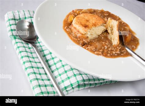 An English Pub Dish Of Beef Cobbler Savoury Minced Beef Stew Topped With Cheese Scone Stock