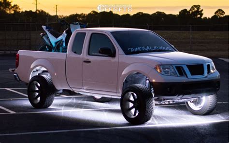 2014 Nissan Frontier With 20x12 51 Toxic Widow And 26550r20 Atturo Trail Blade Xt And