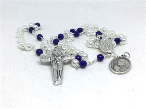 Mother Teresa Praying Rosary