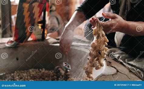 Traditional Silk Production Processing Boiling Silkworm Cocoons In Hot